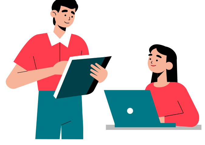 A tutor holding an open folder talks with a student who is working at a laptop.